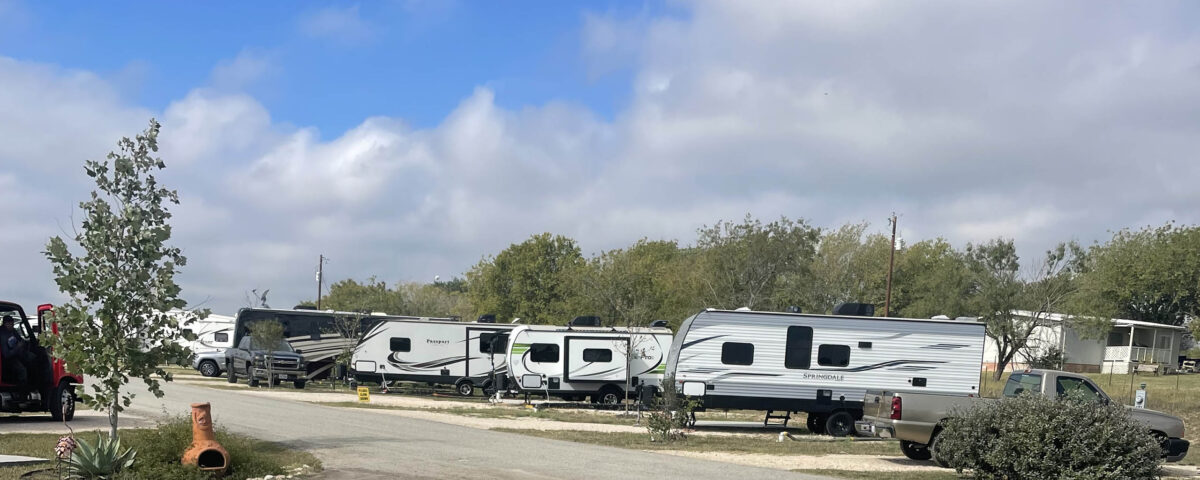 Pull-thru RV sites with gravel pads and hookups