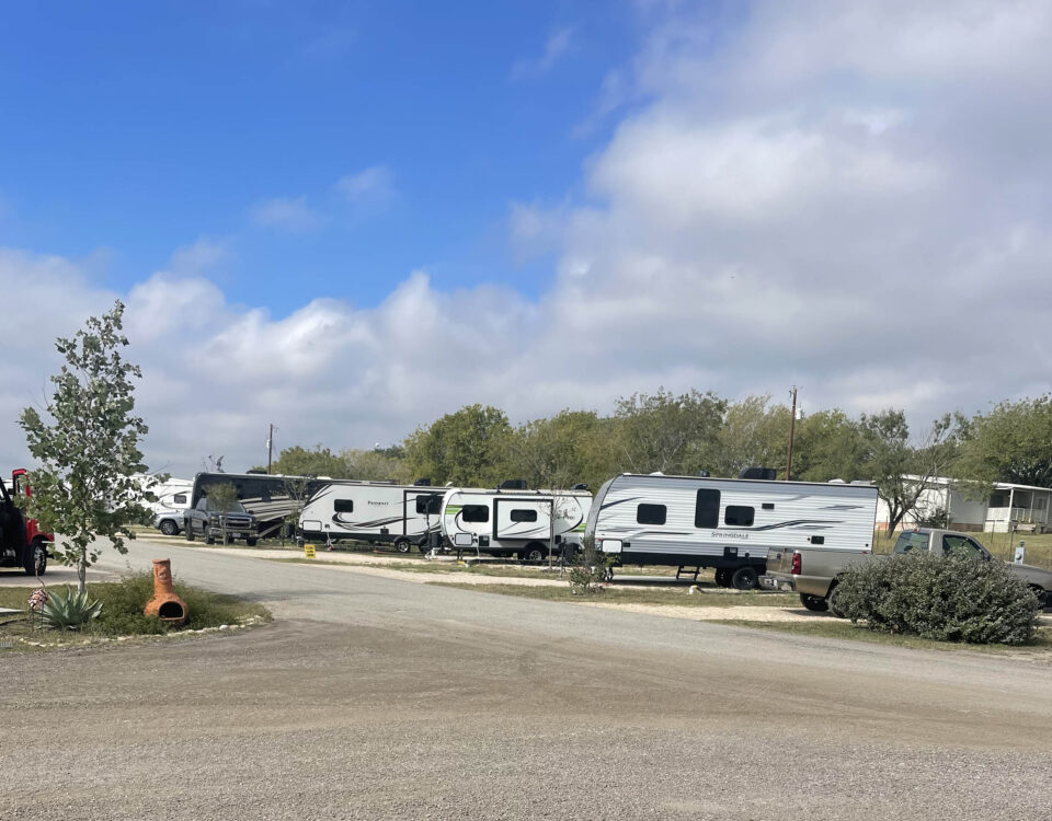 Pull-thru RV sites with gravel pads and hookups